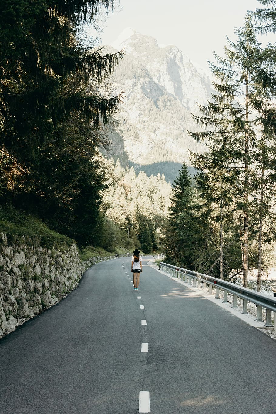 woman standing on asphalt road, woman standing center of road during day time HD wallpaper