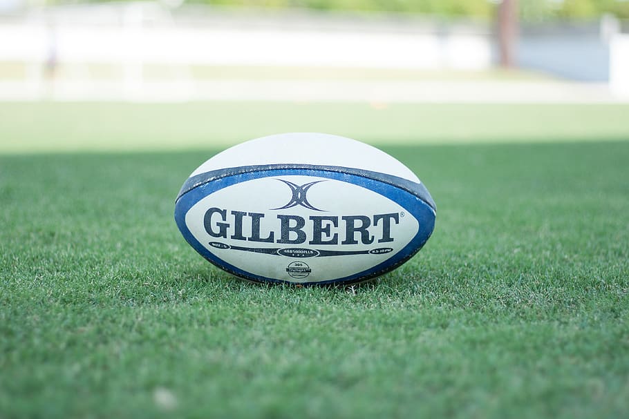 selective focus photography Gilbert pigskin ball on field, rugby, HD wallpaper