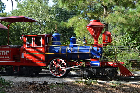 red and blue train on train rails, engine cab, herman park HD wallpaper