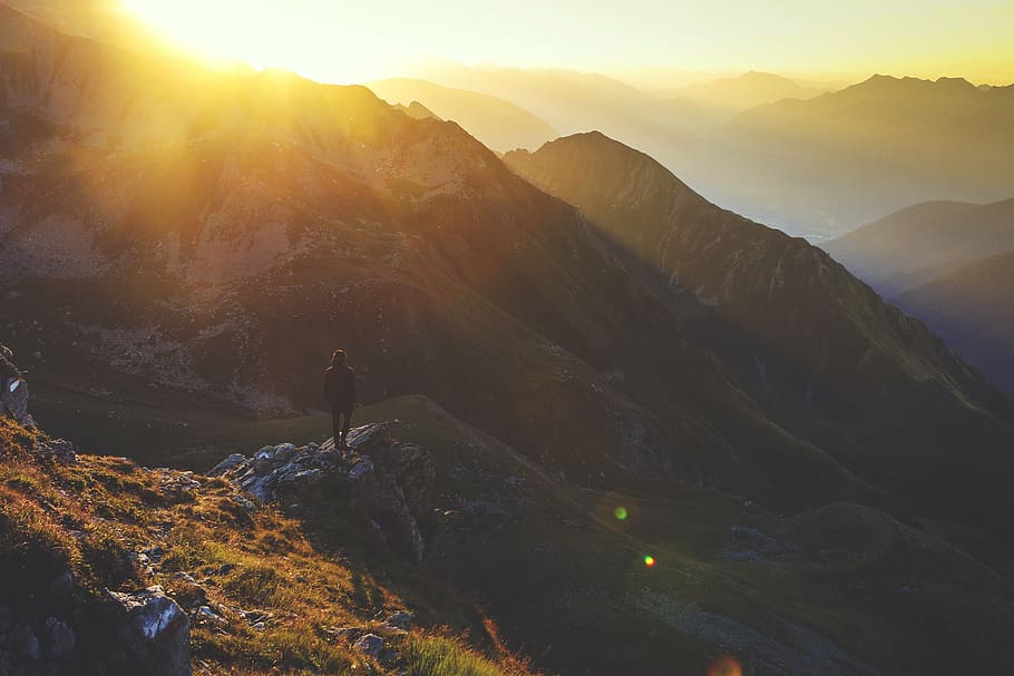 person on top of mountain, black, jacket, standing, stone, near HD wallpaper