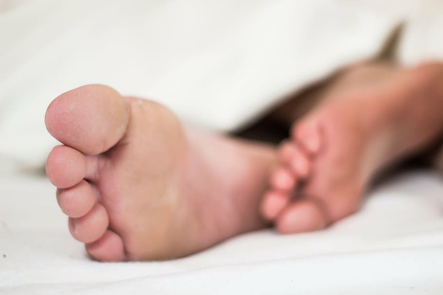 human feet on white textile, sleep, sleepy, nap, exhausted, toes