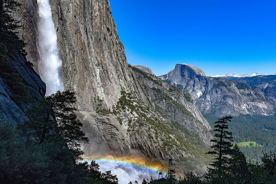 horsetail waterfalls at daytime, gray mountain with water falls under the blue sky at daytime HD wallpaper