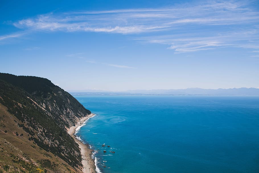 landscape photography of body of water beside mountains, aerial photography of body of water beside mountain HD wallpaper