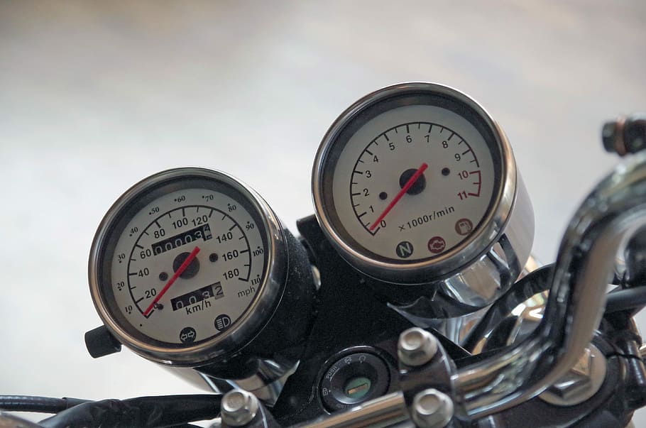 silver motorcycle speedometer, display instrument, tachometer