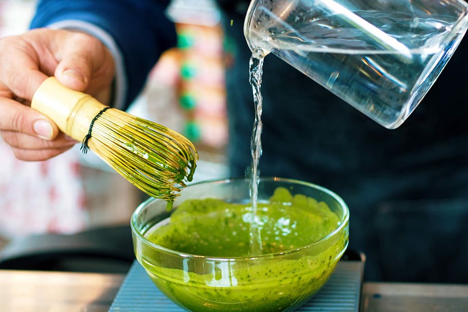 person pouring water into bowl, matcha, tea, green, mixing HD wallpaper
