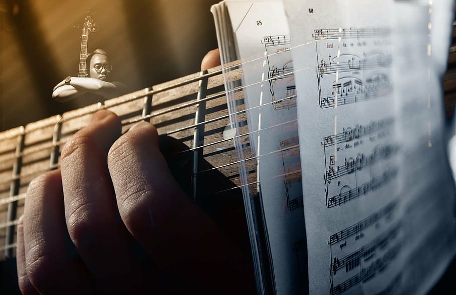 closeup photo of person playing guitar with musical notes, guitarist HD wallpaper
