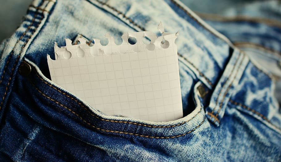 shallow focus of white paper in jeans, stickies, note, pocket HD wallpaper