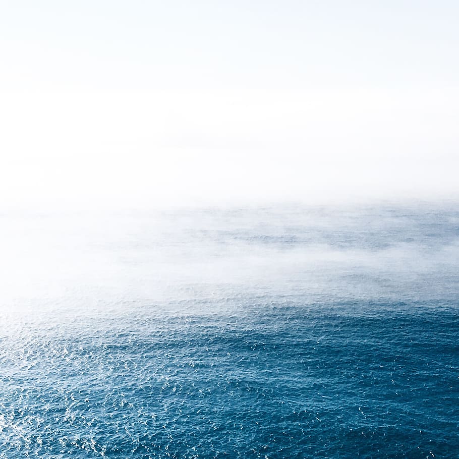 blue calm ocean, body of water with smoke during daytime, photo HD wallpaper