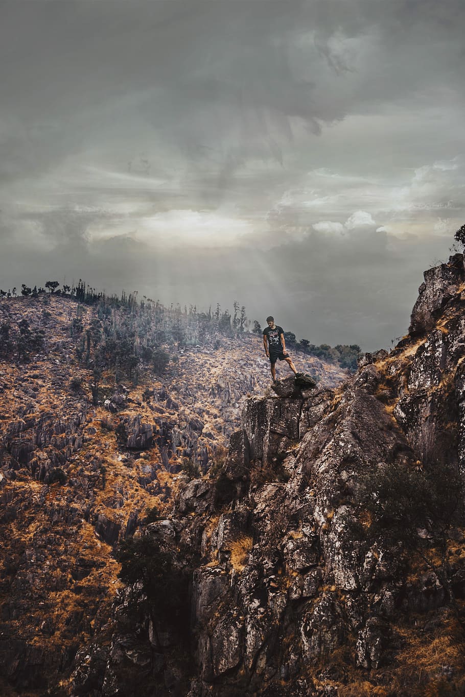 man on cliff mountain, person standing on rock mountain, portrait HD wallpaper