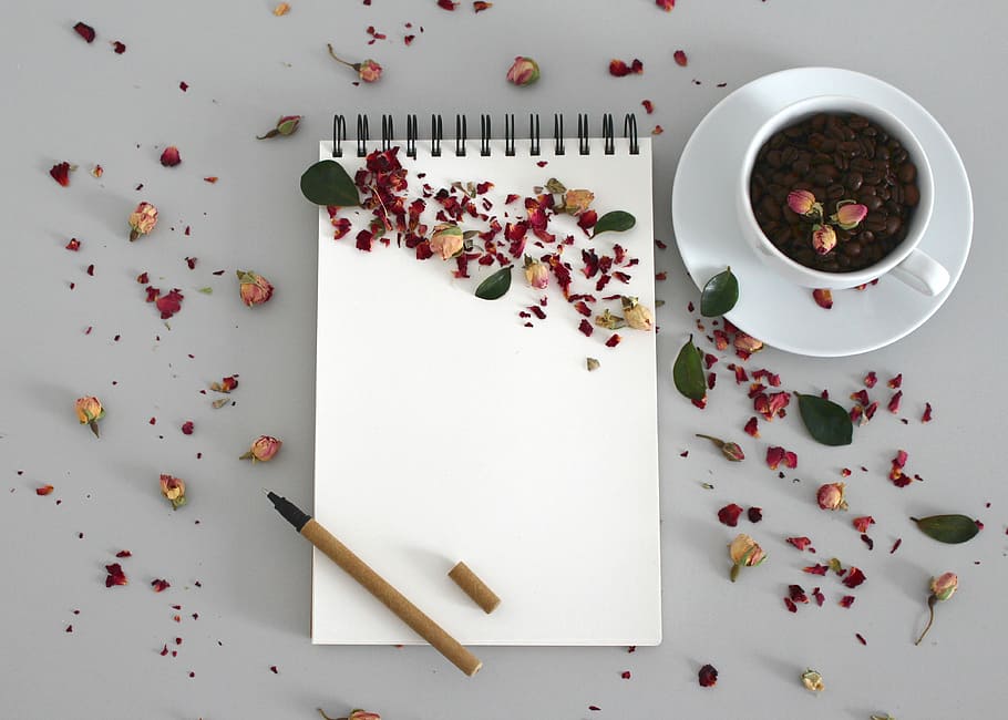pencil on sketchpad near mug with coffee on table, notebook HD wallpaper