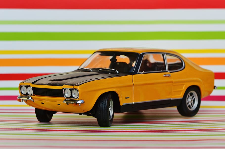 closeup photography of orange and black Ford Torino die-cast metal model HD wallpaper