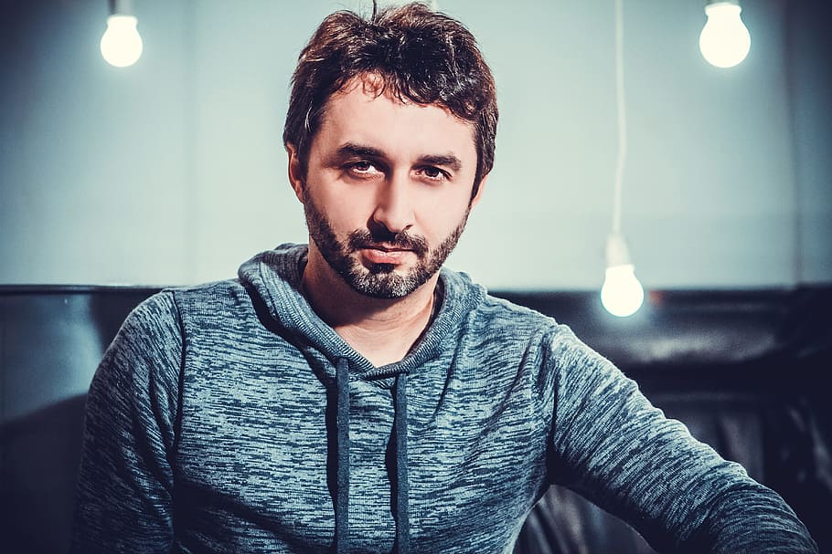 man wearing heater gray pullover jacket, studio, guy, bulbs HD wallpaper