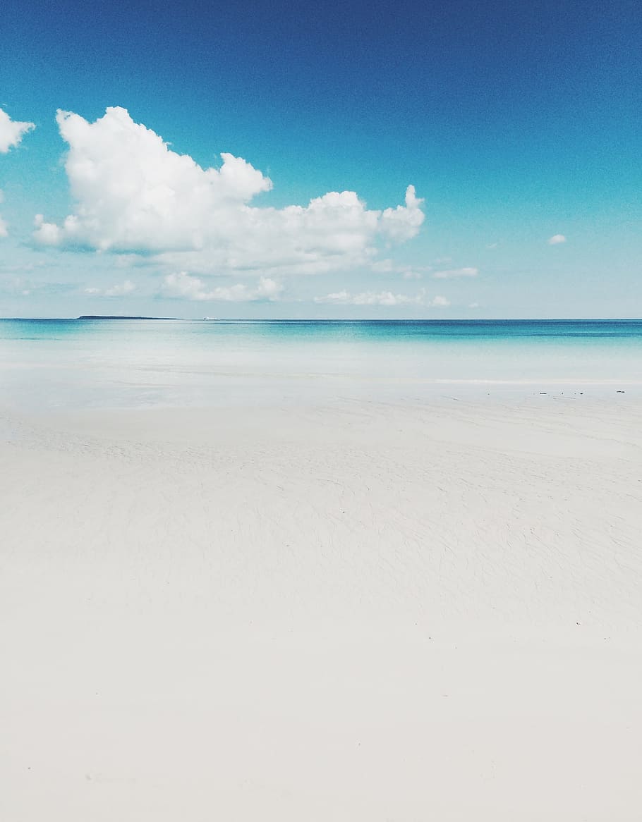 white sands near ocean water under sunny cloudy sky, sea, blue