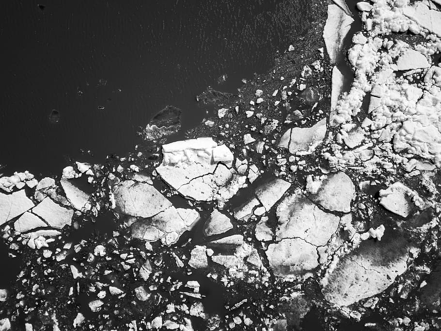 aerial photography of icebergs, grayscale photography of rock formations near body of water HD wallpaper