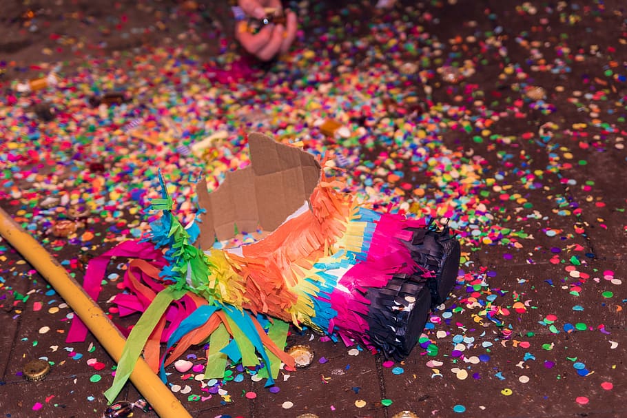 open pinata on floor, piñata, party, celebration, birthday, play