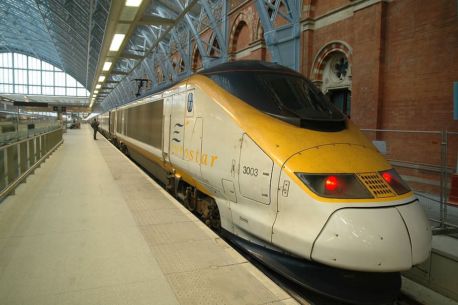 person standing in front of train, United Kingdom, London, Eurostar