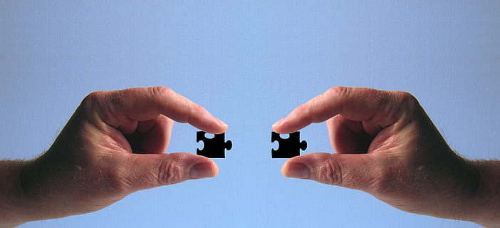 two black metal fragments, hand, keep, puzzle, finger, fit HD wallpaper