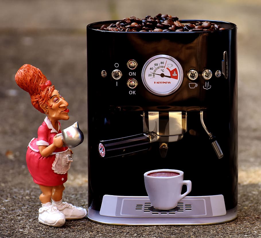 woman wearing apron ceramic figure beside black espresso maker HD wallpaper