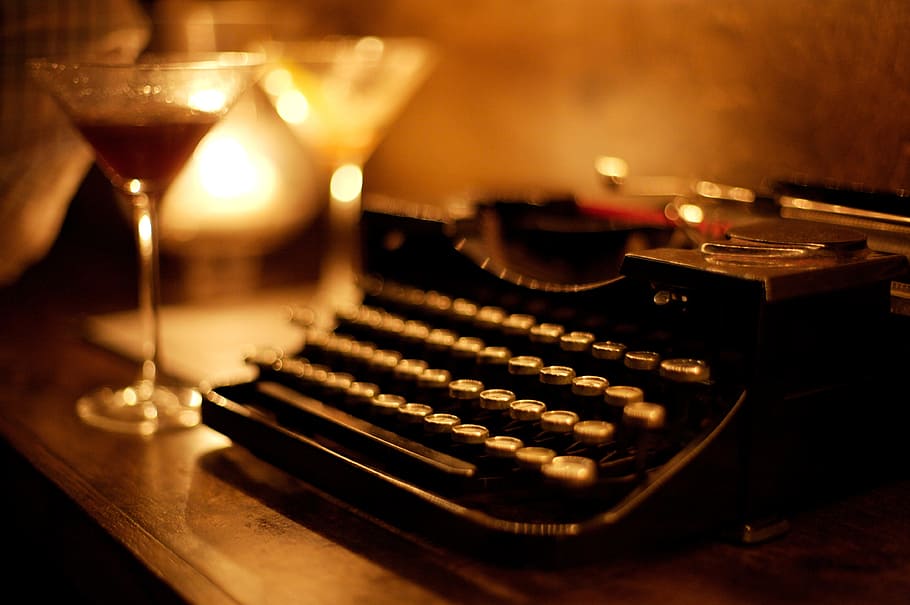 bokeh shot of black typewriter, keyboard, table, display, lamp HD wallpaper