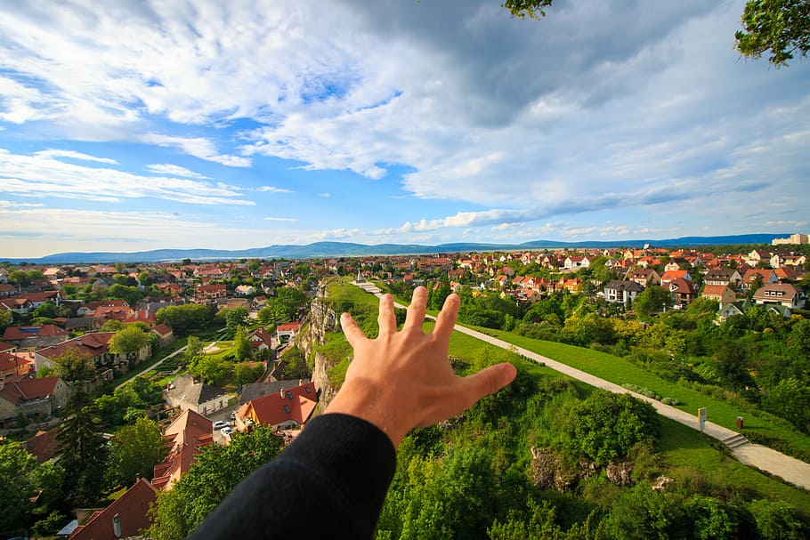 architecture, city, clouds, countryside, grass, green, hand HD wallpaper