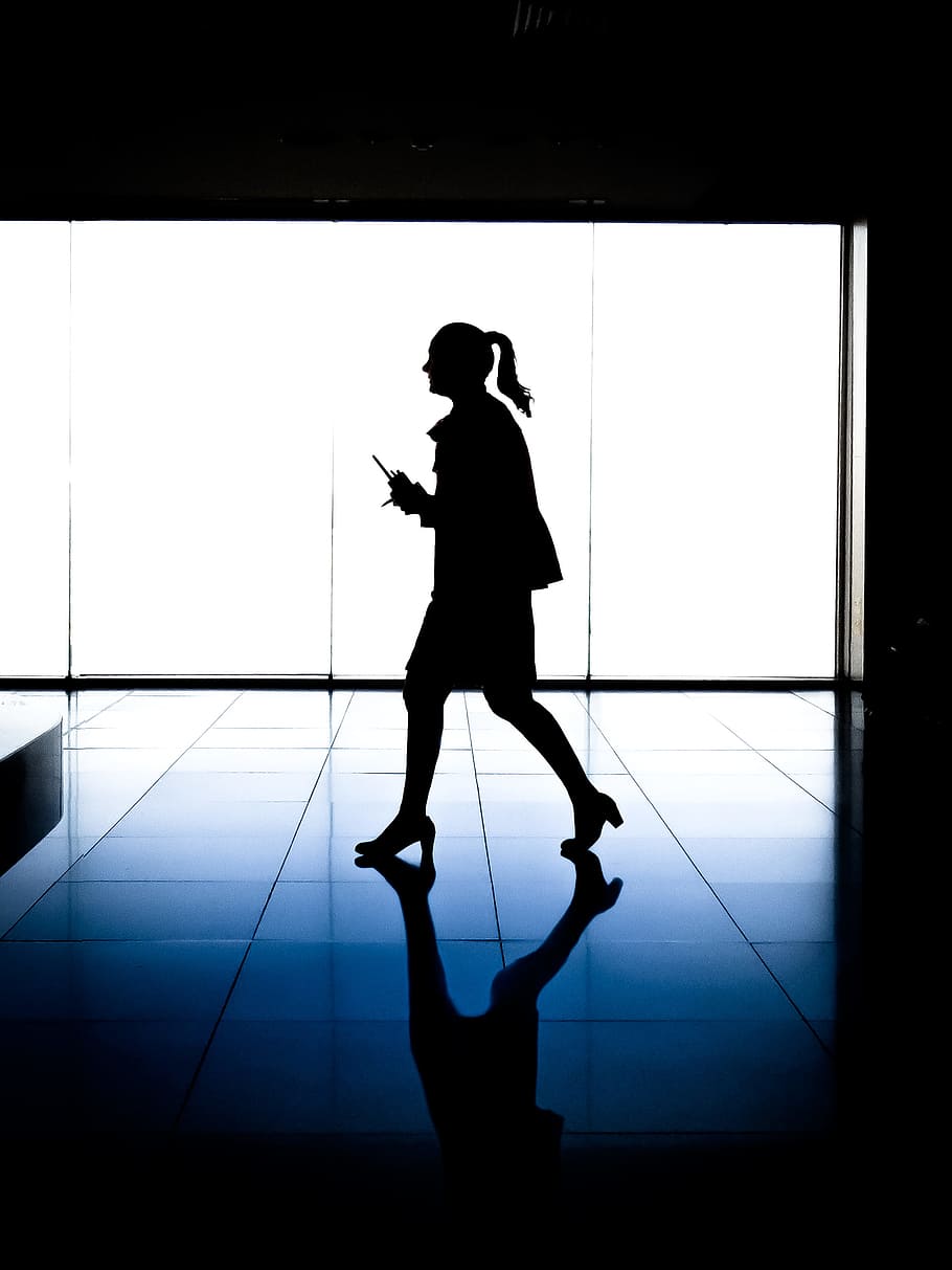 Striding Stewardess, silhouette of woman holding stick walk near glass wall, HD wallpaper