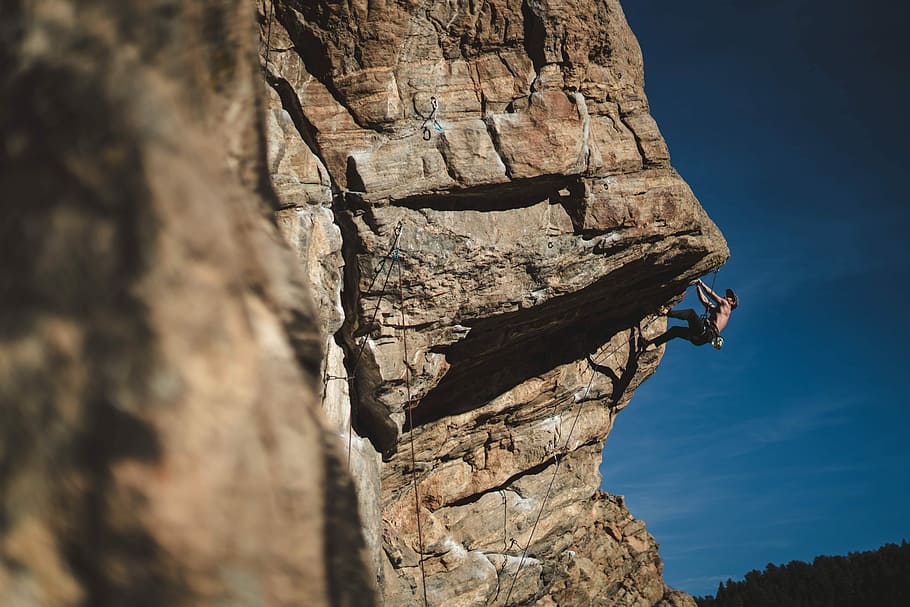 person climbing hills, man doing mountain climbing, rock, cliff, HD wallpaper