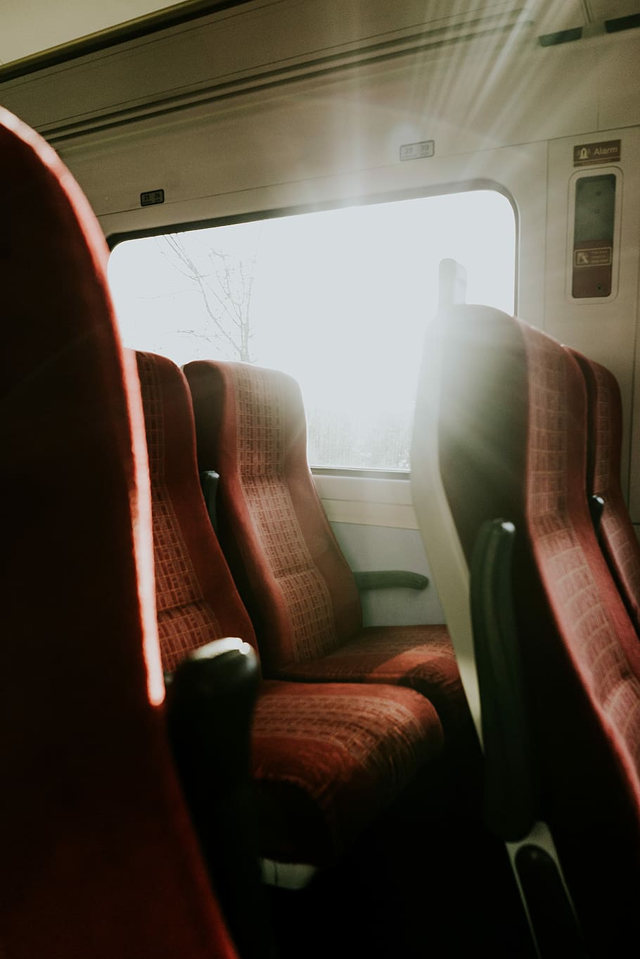 brown leather car seat, red and black train seats, window, sunlight HD wallpaper