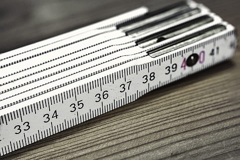 white wooden ruler in selective focus photography, folding rule HD wallpaper