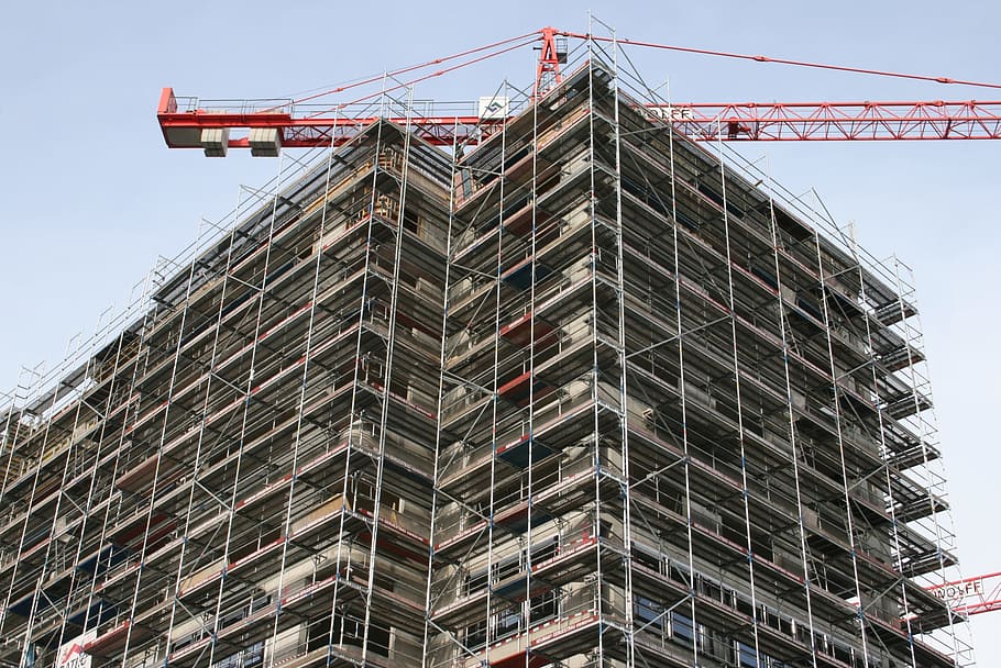 low angle photography of gray high rise building during daytime HD wallpaper