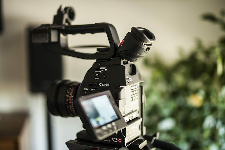 Canon DSLR camera, selective focus photography of black DSLR camera HD wallpaper