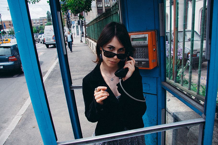 Girl in phone booth, lifestyle, people, using Phone, telephone, HD wallpaper
