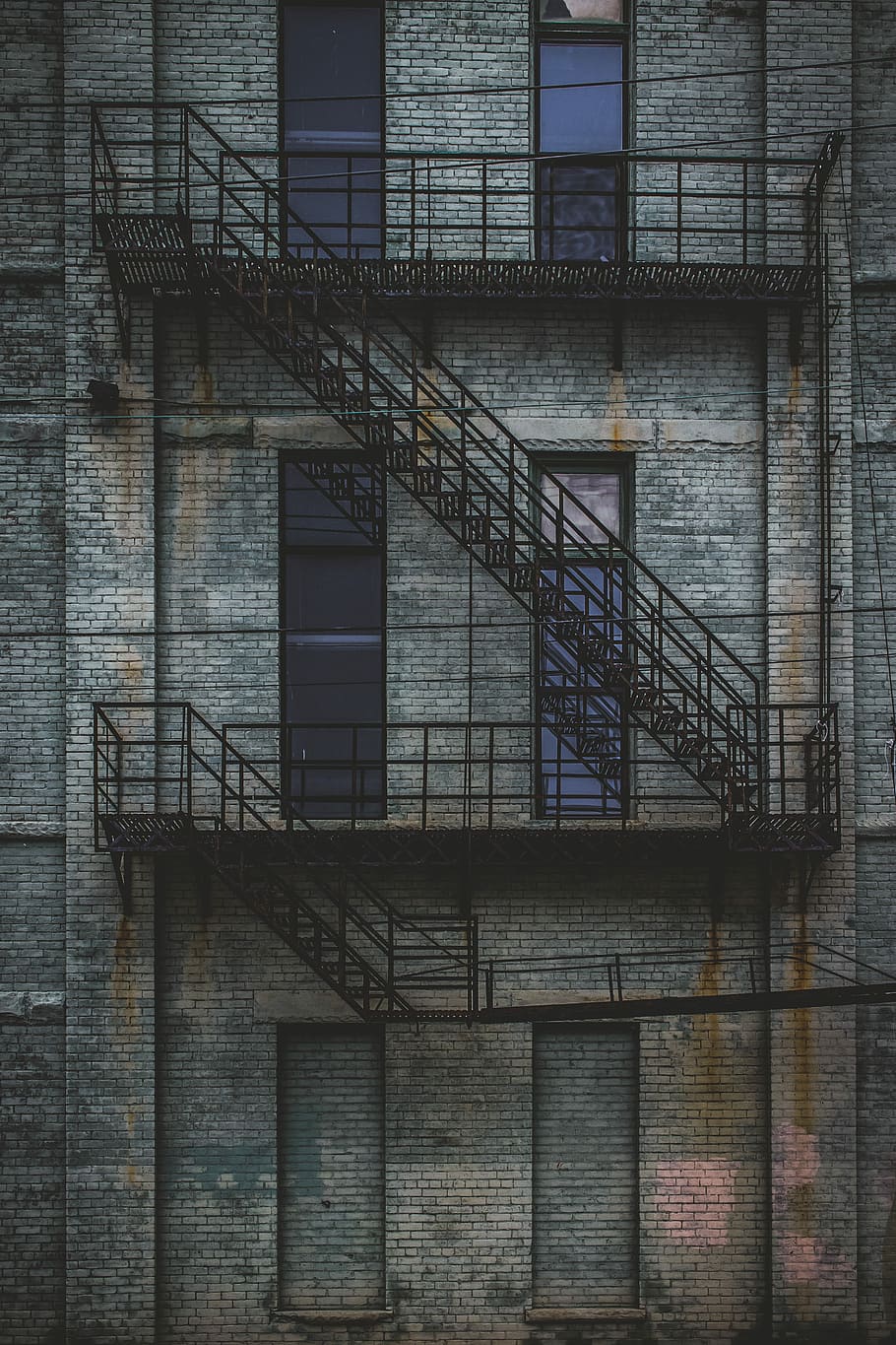 black steel staircase, black exit stairs 3-storey building, brick HD wallpaper