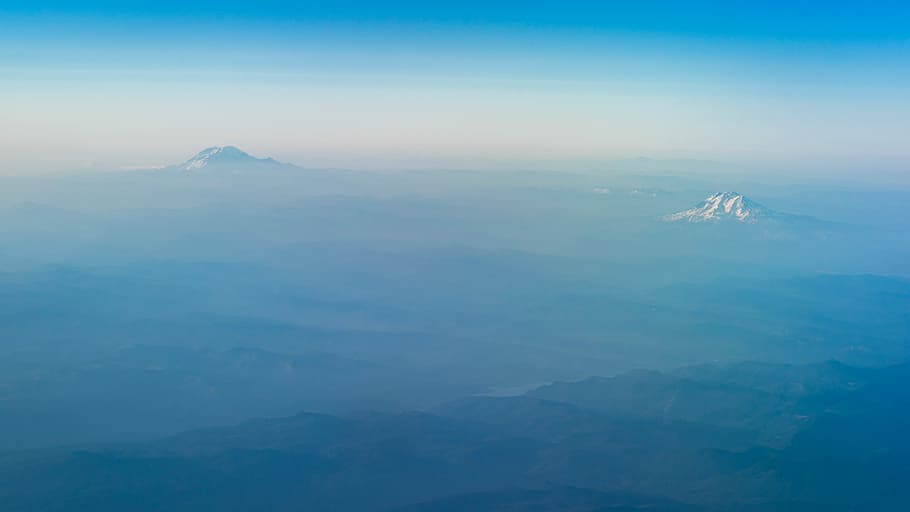 bird's eye view of mountain tip, blue sky, peak, aerial view HD wallpaper