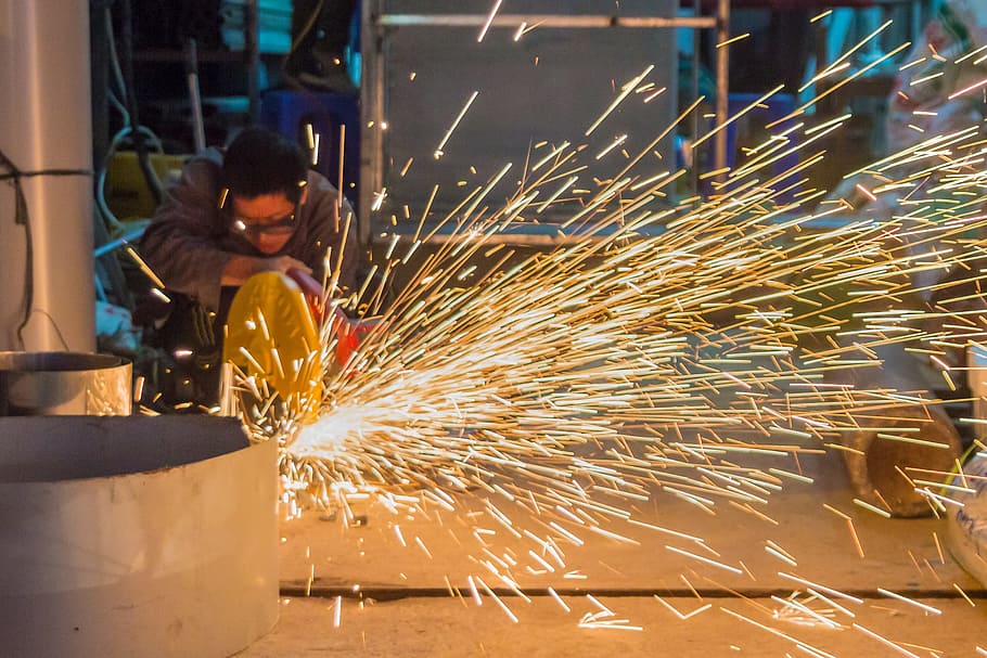 time lapse photography of man cutting metal, workshop, sparks HD wallpaper