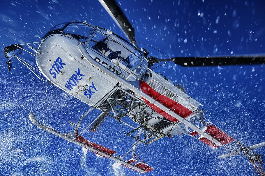 low angle view of white and red helicopter, closeup photo flying helicopter HD wallpaper
