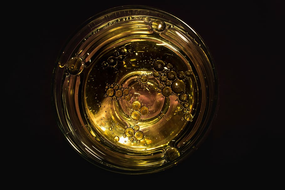 clear drinking glass with liquor, drops, gold, water, liquid HD wallpaper