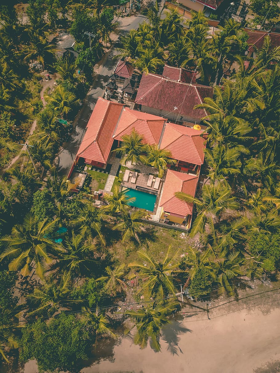 aerial photo of concrete house with swimming pool, bird's-eye view photography of house with pool