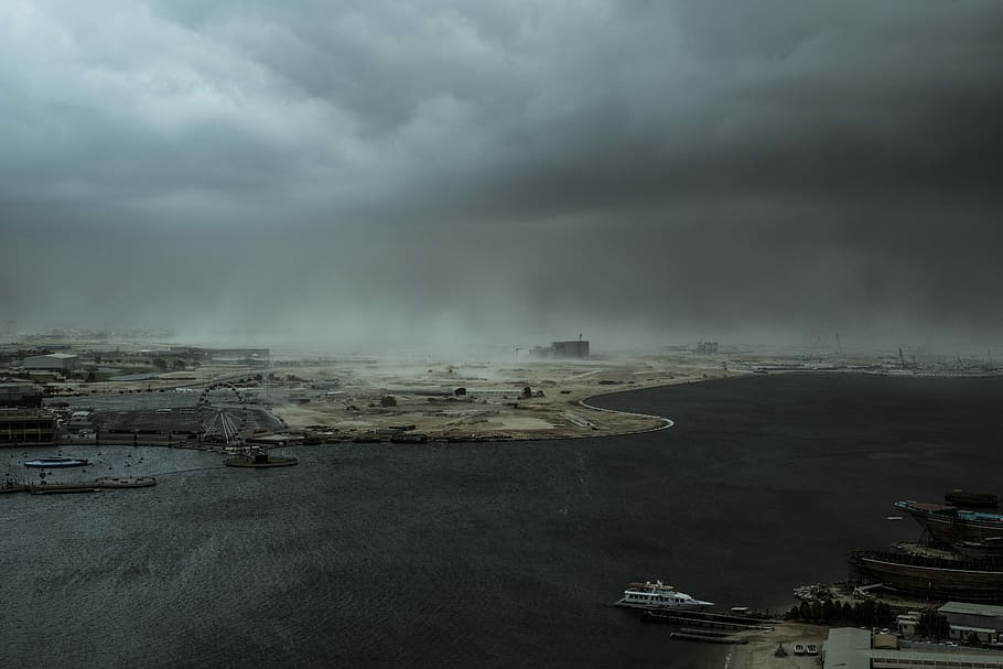 aerial photo on sea port with gloomy clouds, white boat on body of water HD wallpaper