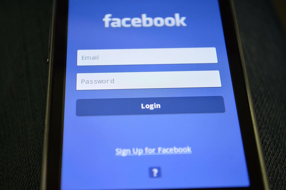 black Android smartphone displaying Facebook application, login HD wallpaper