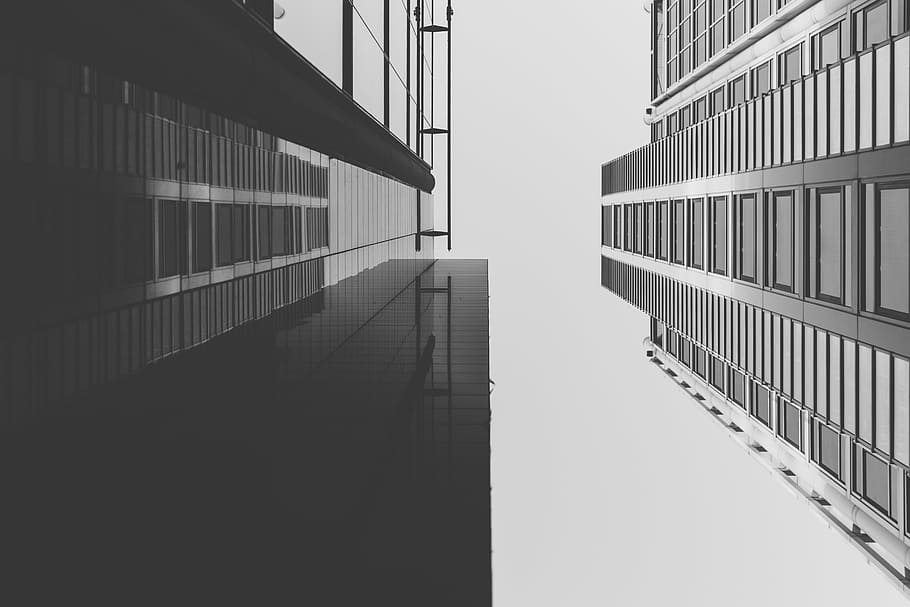 grayscale photography of gray buildings, skyscraper, high rise HD wallpaper