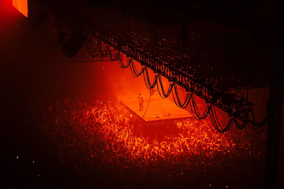photo of people near stage, man standing on stage surrounded by people HD wallpaper