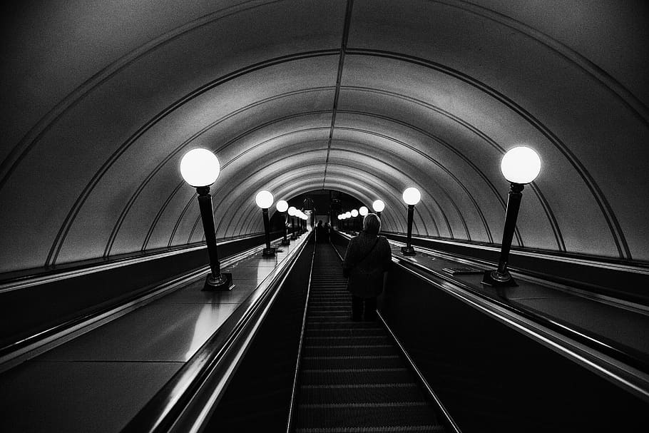HD wallpaper: grayscale photo of person riding escalator inside dome ...