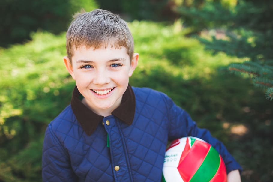 boy holding red, white, and green volleyball, young, little HD wallpaper