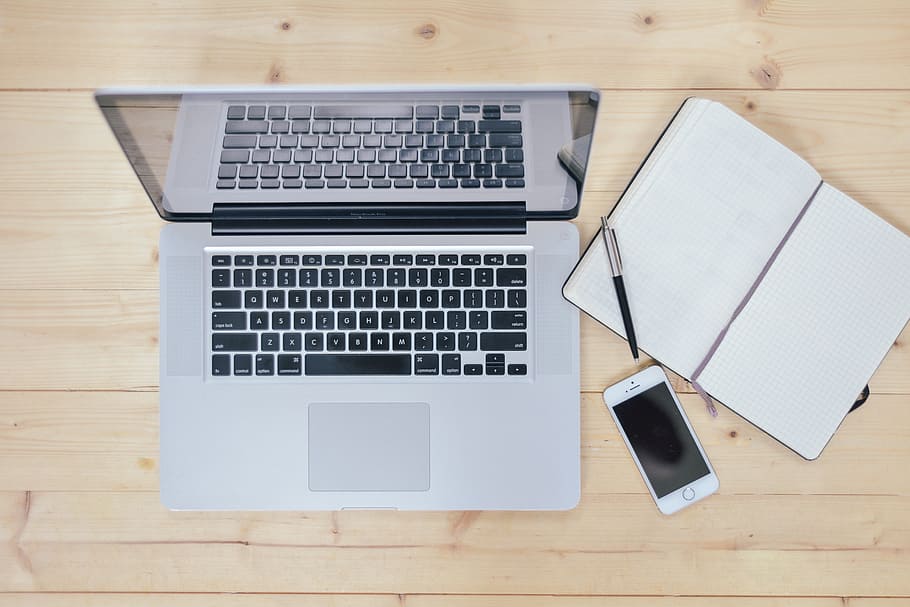 MacBook Pro and silver iPhone 5s, laptop, notebook, desk, work HD wallpaper