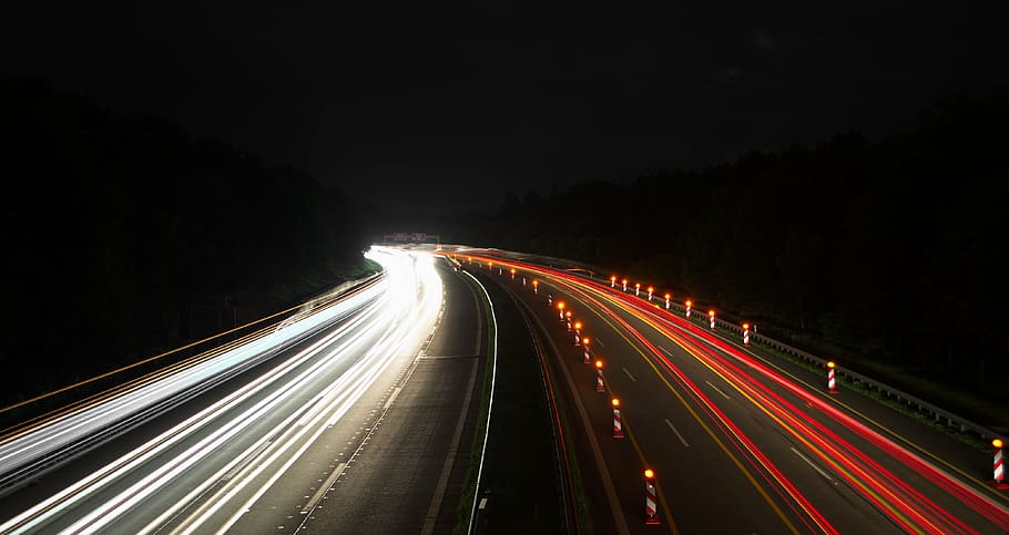 timelapse photography of traveling vehicles during nighttime HD wallpaper