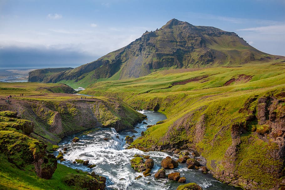 photo of river and green grass covered moutain, ranging river through mountain HD wallpaper