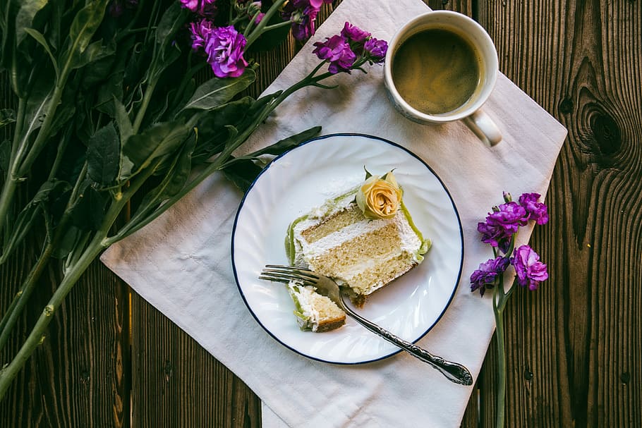 slice of cake on white ceramic plate with stainless steel fork, round plate of sliced cake with fork beside HD wallpaper