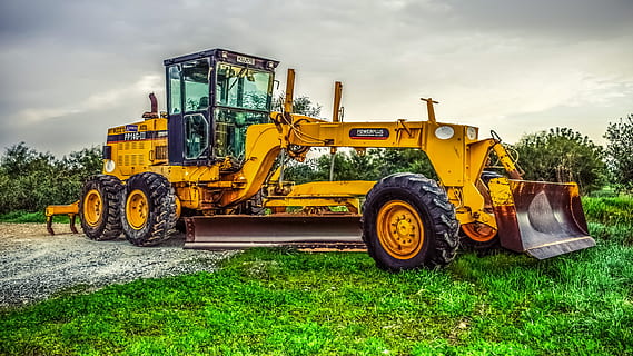 yellow excavator on green grass, machine, tractor, heavy, wheel HD wallpaper