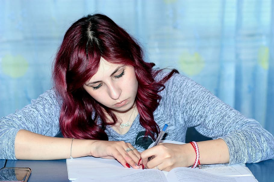 woman wearing gray long-sleeved shirt writing on paper, study HD wallpaper
