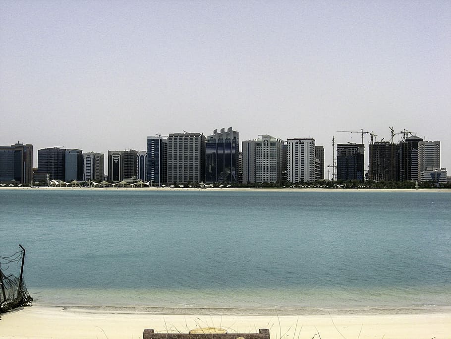 Skyline from across the water of Abu Dhabi, United Arab Emirates, UAE, HD wallpaper